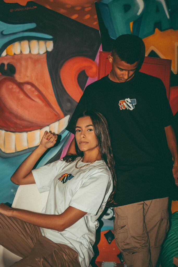 pexels-photo-13640867-13640867 Vibrant portraits of a young couple in front of urban street art, exuding modern style.